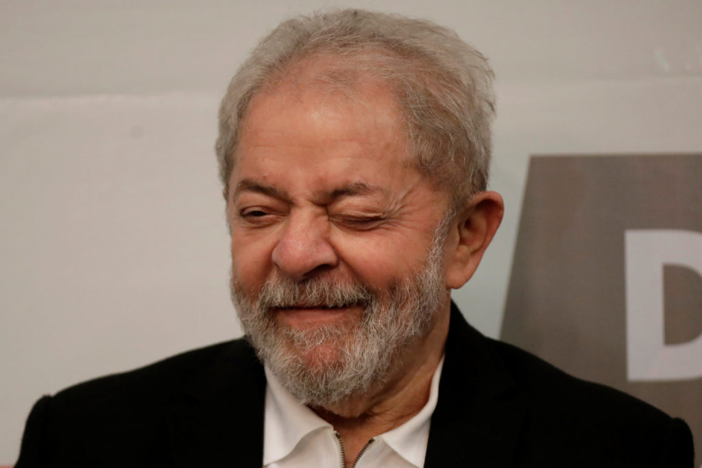 Former Brazil's President Luiz Inacio Lula da Silva reacts during a seminar on public education in Brasilia