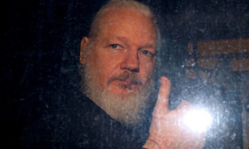 x85767097_FILE-PHOTO-WikiLeaks-founder-Julian-Assange-is-seen-as-he-leaves-a-police-station-in-Lo.jpg.pagespeed.ic.wcGF-Ml1ZB