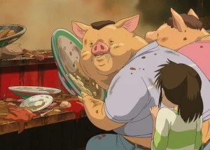 Trecho-do-filme-de-A-Viagem-de-Chihiro-em-que-os-pais-da-protagonista-sao-transformados-em-porcos-apos-comerem-um-banquete-ofertado-para-os-espiritos-A-Viagem-de-Chihiro-Reproducao-750x536