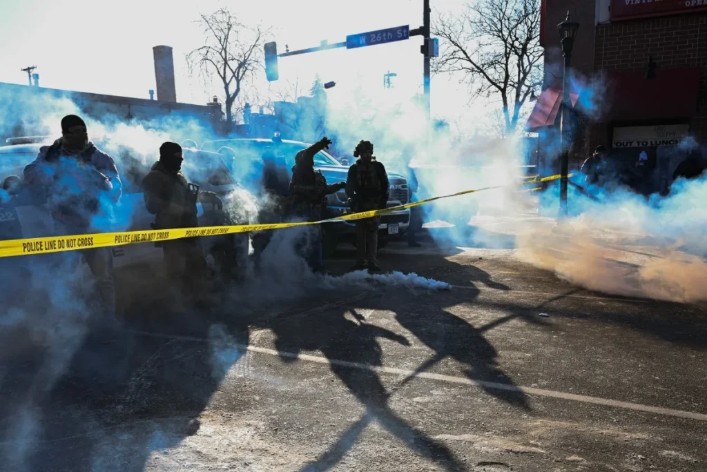 AFP__20260124__93VY2UH__v4__MidRes__ProtestsAfterUsImmigrationOfficerKillsWomanInMin
